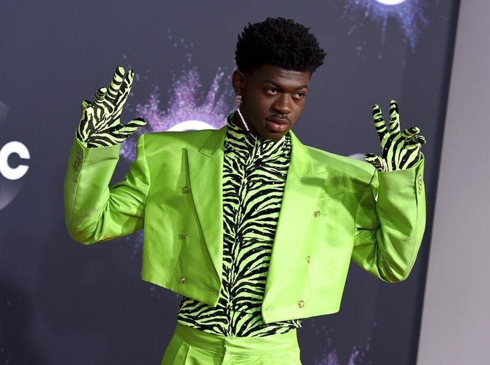 Lil Nas X arrives at the American Music Awards on Sunday, Nov. 24, 2019, at the Microsoft Theater in Los Angeles. (Photo by Jordan Strauss/Invision/AP)