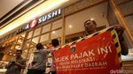 Melihat Mal Baywalk Pluit Berhiaskan Stiker Tunggak Pajak