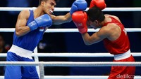 Laga ini merupakan semifinal tinju kelas 60 kg putra.