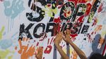 Ramai-ramai Bubuhkan Cap Tangan di Hari Anti Korupsi Sedunia