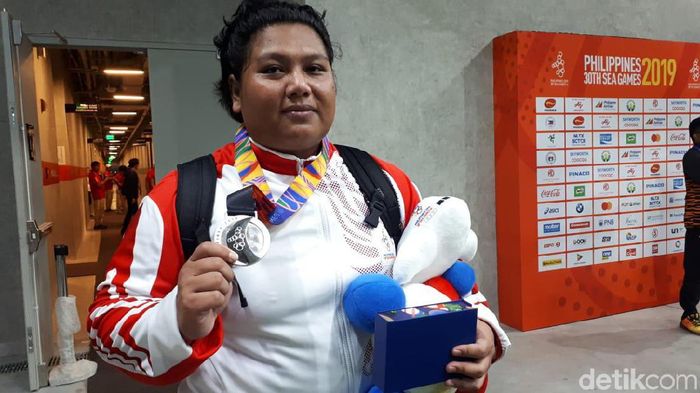 (Mercy Raya/detikSport)Eki Febri Ekawati meraih perak di SEA Games 2019 Filipina, Selasa(10/12/2019). Dia membuat tolakan sejauh 15,08 meter. (Mercy Raya/detikSport)Eki Febri Ekawati meraih perak di SEA Games 2019 Filipina, Selasa(10/12/2019). Dia membuat tolakan sejauh 15,08 meter.