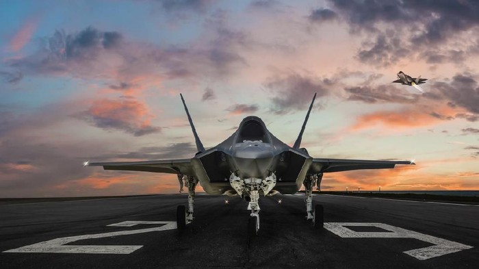 F-35 fighter jet ready to takeoff on runway at sunset
