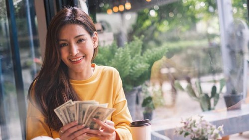 Aged and young women sitting staring at each other with distrust and animosity, focus on millennial girl. Different ages various generations employees conflict fight for company position or leadership