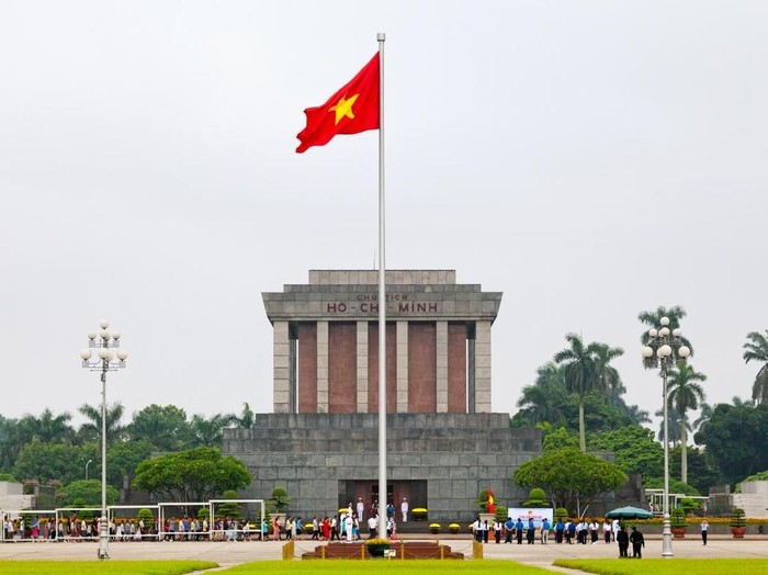 Flag of Vietnam in front of a clear blue sky