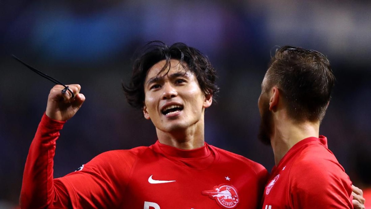 Takumi Minamino mewujudkan mimpinya dengan bergabung Liverpool. (Foto: Dean Mouhtaropoulos/Getty Images)