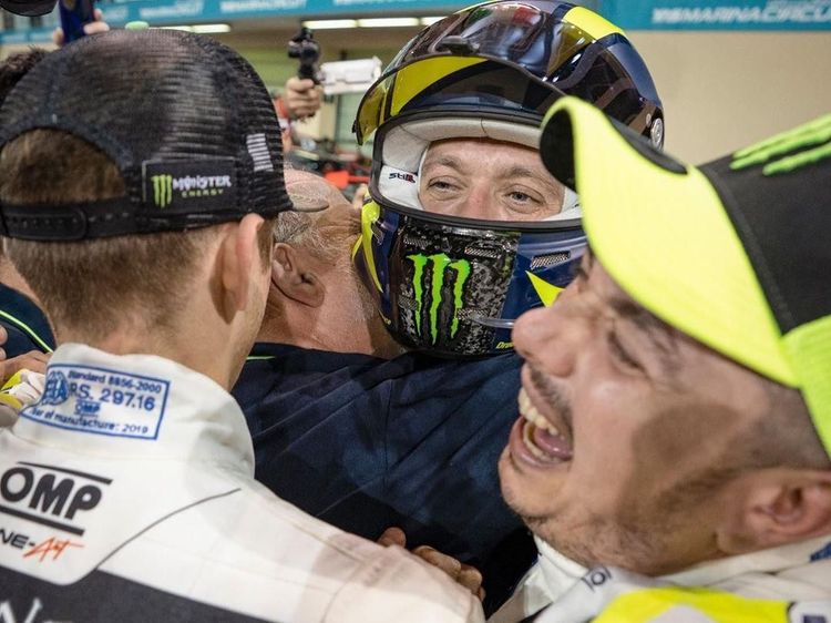 Senyum Semringah Rossi Usai Finis Ketiga di Balapan Mobil