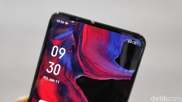 Ponsel prototype Oppo yang punya kamera depan di bawah layar. 