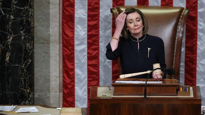 WASHINGTON, DC - DECEMBER 18:  Speaker of the House Nancy Pelosi (R) (D-CA) speaks at a press conference following the impeachment vote in the House of Representatives against U.S. President Donald Trump. The House voted in favor of two articles of impeachment against Trump on charges of abuse of power and obstruction of justice, making Trump the third U.S. President to be impeached. (Photo by Win McNamee/Getty Images)