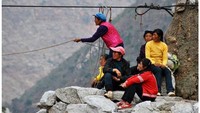 Jembatan ini kemudian memberi manfaat yang lebih banyak bagi warga. Foto: Dok. Xinhua/Yang Wenbin