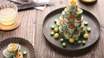 Nyam! Pohon Natal Ini Terbuat dari Makanan, Ada Petai hingga Donat