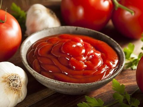 Maarssen, The Netherlands - November 24, 2011: Studio shot of a bottle of Heinz Tomato Ketchup, manufactured by H.J. Heinz Company