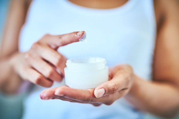 skincare Cropped shot of an unrecognizable woman using a skincare product