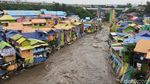 Kampung Warna-warni dan Meluapnya Sungai Brantas