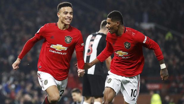 Mason Greenwood dan Marcus Rashford mencetak gol untuk MU. (