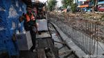 Tanggul, Bentengi Kampung Rawa Johar Baru dari Banjir
