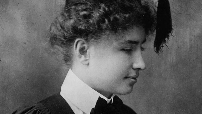 1904:  American lecturer and writer Helen Adams Keller (1880 - 1968) on the day of her graduation from Radcliffe College, Massachusetts. Blind, deaf and mute from the age of one, she was taught to read Braille, speak and lipread with her fingers by teacher Anne Sullivan.  (Photo by Topical Press Agency/Getty Images)