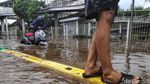 Banjir Lumpuhkan Jalan Perintis Kemerdekaan Jakarta