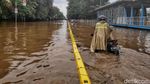 Banjir Lumpuhkan Jalan Perintis Kemerdekaan Jakarta