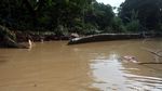 Tanggul Perumahan Puri Nusa Phala Jati Asih Jebol