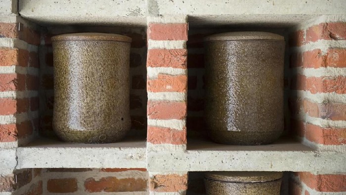 Two urns in a wall outside a cremarorium