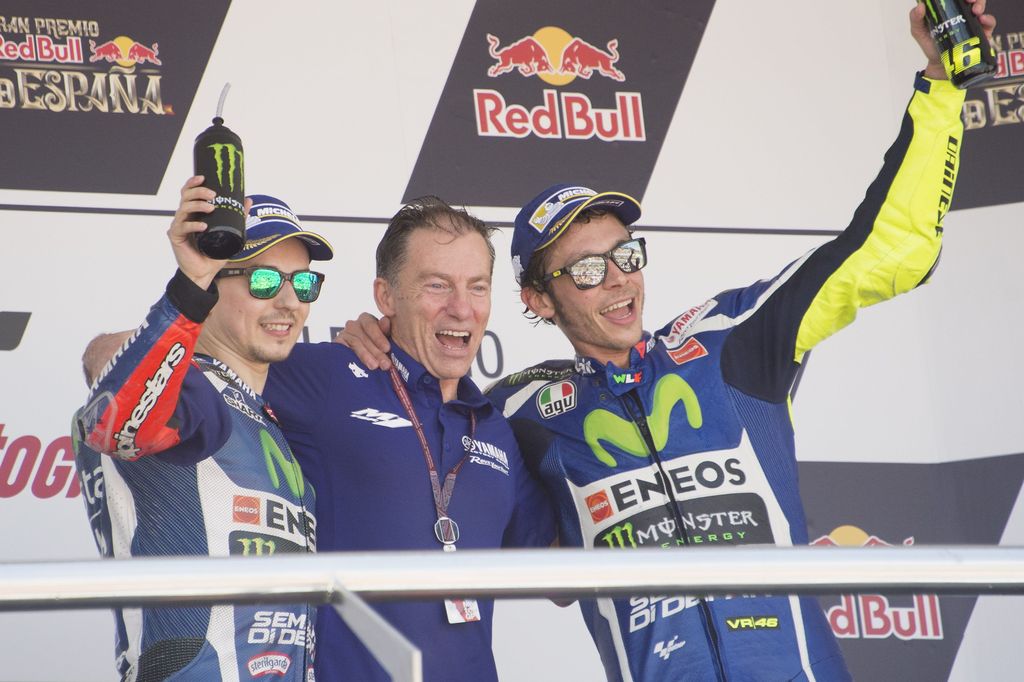 JEREZ DE LA FRONTERA, SPAIN - APRIL 24:  (L-R) Jorge Lorenzo of Spain and Movistar Yamaha MotoGP,  Lin Jarvis of Britain and Yamaha Factory Team and Valentino Rossi of Italy and Movistar Yamaha MotoGP  on the podium at the end of the MotoGP race during the MotoGp of Spain - Race at Circuito de Jerez on April 24, 2016 in Jerez de la Frontera, Spain.  (Photo by Mirco Lazzari gp/Getty Images)
