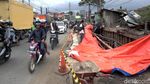 Potret Jalan Nasional yang Amblas Akibat Banjir