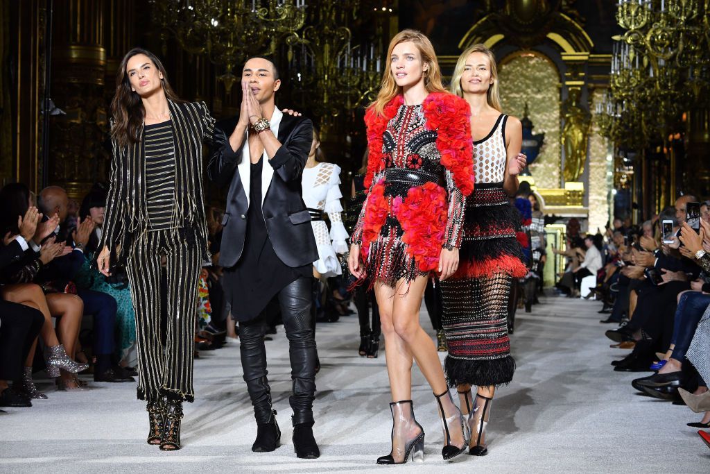 PARIS, FRANCE - SEPTEMBER 28:  Designer Olivier Rousteing and models Alessandra Ambrosio,Natalia Vodianova and Natasha Poly walk the runway during the Balmain show as part of the Paris Fashion Week Womenswear Spring/Summer 2018 on September 28, 2017 in Paris, France.  (Photo by Pascal Le Segretain/Getty Images)
