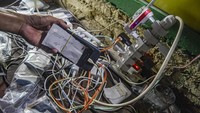 Dengan membayar Rp 5.000 warga dapat mengisi daya listrik barang elektronik mereka hingga penuh.