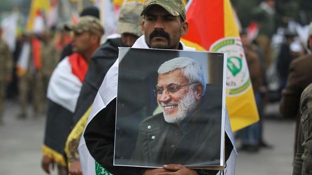 Jenazah Wakil Komandan milisi Hashed al-Shaabi, Abu Mahdi al-Muhandis, juga diarak bersama Soleimani