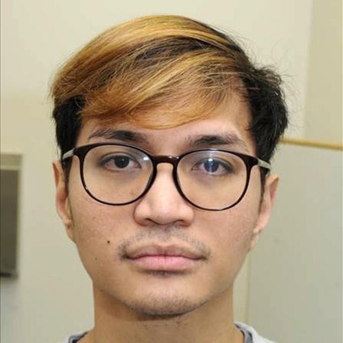 This is an undated handout photo issued by  Greater Manchester Police (GMP) on Monday, Jan. 6, 2020 of Reynhard Sinaga.  A man described as â€œthe most prolific rapist in British legal historyâ€ has been sentenced to life in prison with a possible release after 30 years following his conviction for sexual offenses against 48 men. (GMP via AP)