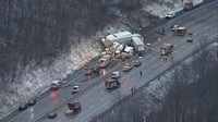 Kecelakaan itu menutup sebagian besar jalan raya. KDKA TV via AP.