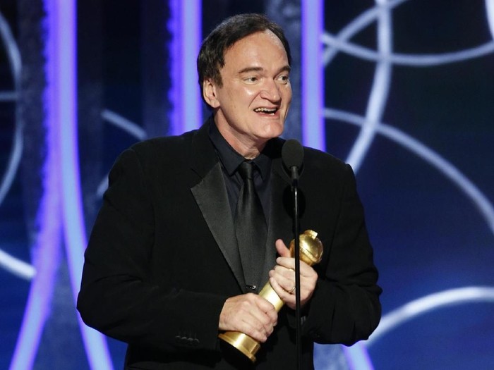 BEVERLY HILLS, CALIFORNIA - JANUARY 05: In this handout photo provided by NBCUniversal Media, LLC,  Quentin Tarantino accepts the award for BEST SCREENPLAY - MOTION PICTURE for Once Upon a Time...in Hollywood onstage during the 77th Annual Golden Globe Awards at The Beverly Hilton Hotel on January 5, 2020 in Beverly Hills, California. (Photo by Paul Drinkwater/NBCUniversal Media, LLC via Getty Images)
