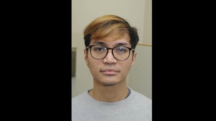 This is an undated handout photo issued by  Greater Manchester Police (GMP) on Monday, Jan. 6, 2020 of Reynhard Sinaga.  A man described as â€œthe most prolific rapist in British legal historyâ€ has been sentenced to life in prison with a possible release after 30 years following his conviction for sexual offenses against 48 men. (GMP via AP)