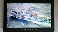 Pergerakan kapal Coast Guard China terlihat melalui layar yang tersambung kamera intai dari Pesawat Boeing 737 Intai Strategis AI-7301 Skadron Udara 5 Wing 5 TNI AU Lanud Sultan Hasanudin Makassar pada Sabtu (4/1/2020). Antara Foto/M Risyal Hidayat.