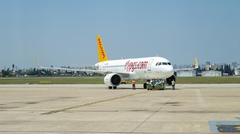 Pegasus Airlines Adana, Turkey - July 27, 2019, Pegasus Airlines aeroplane preparing for flight for Sabiha Gokcen International Airport in Adana Sakirpasa Airport, Turkey.