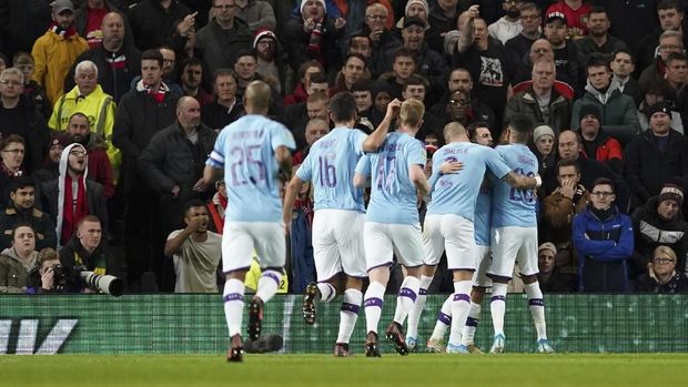 Man City berpestas di Old Trafford.