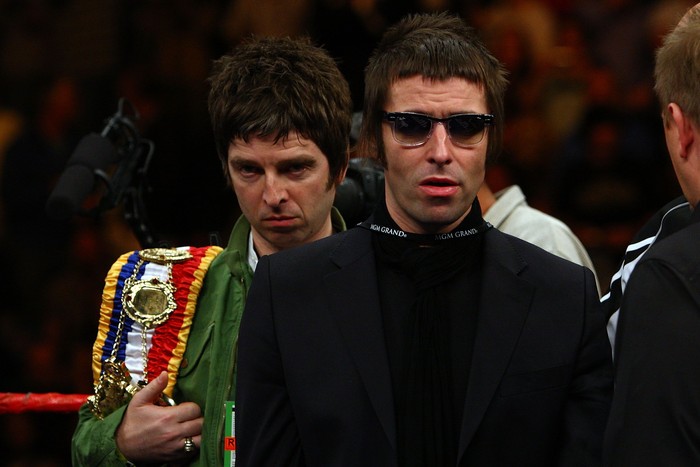 LAS VEGAS - NOVEMBER 22:  Noel and Liam Gallagher of Oasis bring out boxer Ricky Hatton of Englands belts before taking on Paulie Malignaggi during their light-welterweight fight at the MGM Grand Garden Arena November 22, 2008 in Las Vegas, Nevada.  (Photo by John Gichigi/Getty Images)