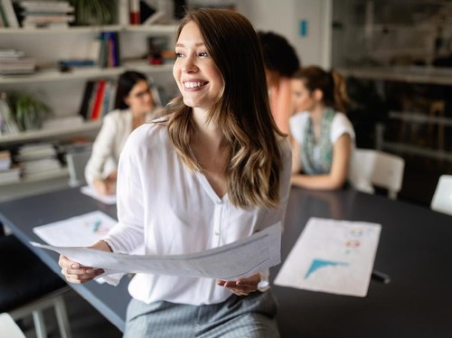 Group of young business people are working together in modern office. Creative people with laptop, tablet, smart phone, notebook. Successful hipster team in coworking. Freelancers.