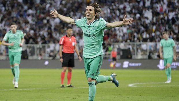 Madrid menang 3-1 atas Valencia.