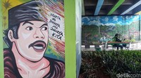 Tanaman hijau dipadu dengan mural dari tokoh Betawi Banyamin semakin membuat nuansa nyaman.