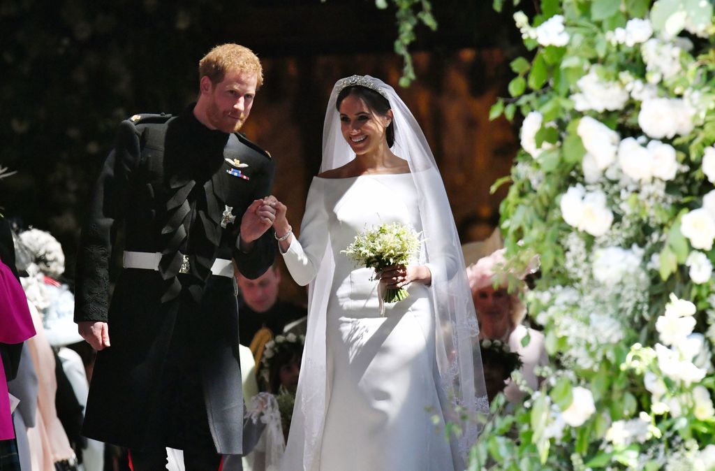WINDSOR, UNITED KINGDOM - MAY 19:  Prince Harry, Duke of Sussex and the Duchess of Sussex depart after their wedding ceremonyat St George's Chapel at Windsor Castle on May 19, 2018 in Windsor, England. (Photo by Jane Barlow - WPA Pool/Getty Images)