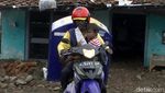 Kisah Penjual Roti yang Berkeliling Sambil Gendong Anak