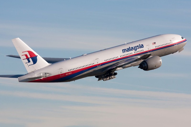 ZÃ¼rich, Switzerland - December 05, 2007: Malaysia Airlines Boeing 777-200/ER departing Zurich airport. On 08 March 2014 this aircraft crashed as flight MH 370 from Kuala Lumpur to Beijing.
