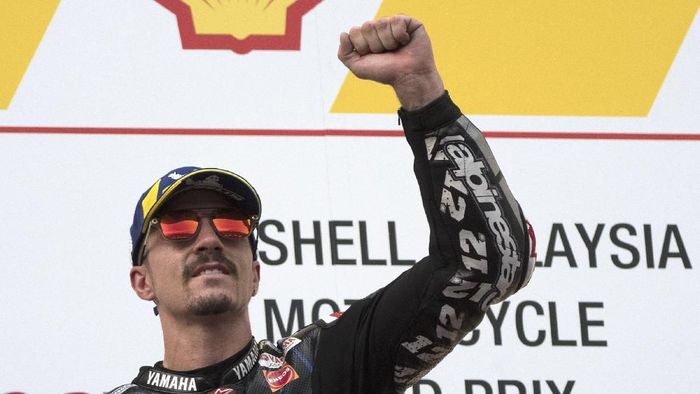 Maverick Vinales KUALA LUMPUR, MALAYSIA - NOVEMBER 03: Maverick Vinales of Spain and Yamaha Factory Racing celebrates the victory on the podium at the end of the MotoGP race during the MotoGP of Malaysia - Race at Sepang Circuit on November 03, 2019 in Kuala Lumpur, Malaysia. (Photo by Mirco Lazzari gp/Getty Images)