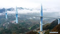 Total 1,5 miliar yuan (sekitar US$ 215 juta) diinvestasikan untuk membangun jembatan ini. Foto: Dok. Xinhua/Liu Xu