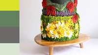 Miri melukiskan bunga daisy di atas kue lengkap dengan pemandangan gunung yang diselimuti salju, cantik sekali! Foto: Instagram @10bloomcakes