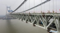 Jembatan ini memadukan jalan bebas hambatan dan kereta api, di Provinsi Jiangsu, Tiongkok timur. Foto: Dok. Xinhua/Li Bo