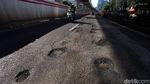 Musim Hujan, Jalan Rasuna Said Berlubang