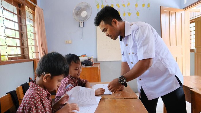 Syahrul Hakim (26) Guru SLB sekaligus Mitra Driver Grab di Makassar. (Dok. Grab)