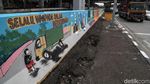 Warna-warni Mural Kritik Sosial Hiasi Dinding Jalan di Ancol